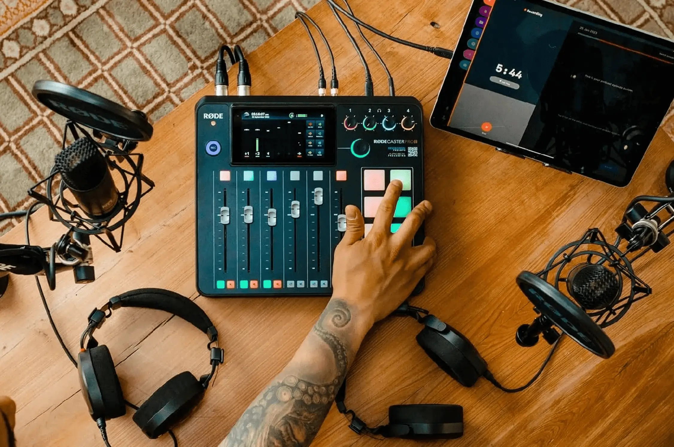 Professional podcast equipment on wooden table
